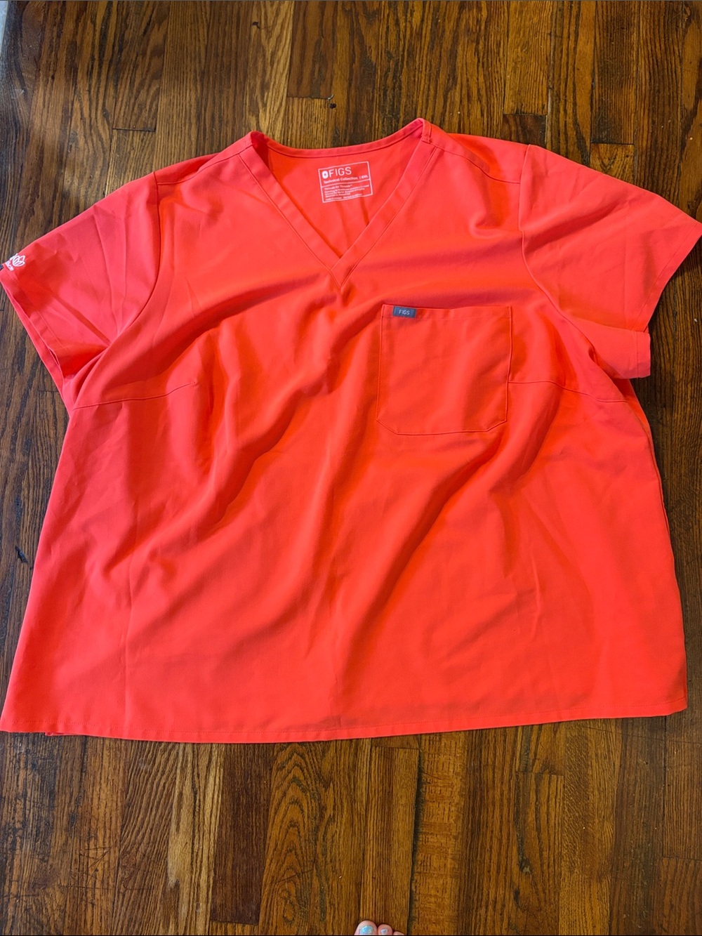 Figs Short Sleeve V-Neck Scrub Top in Bright Coral/Orange